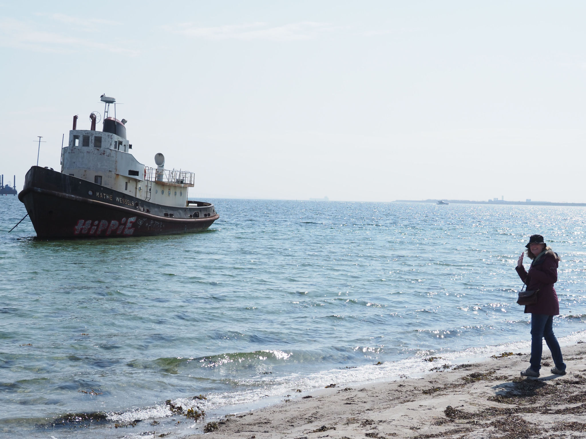  Denmark, 27 Apr 2024  This old tug, the Käthe Wessels, is grounded  and  anchored just off the beach of Amager Strandpark.