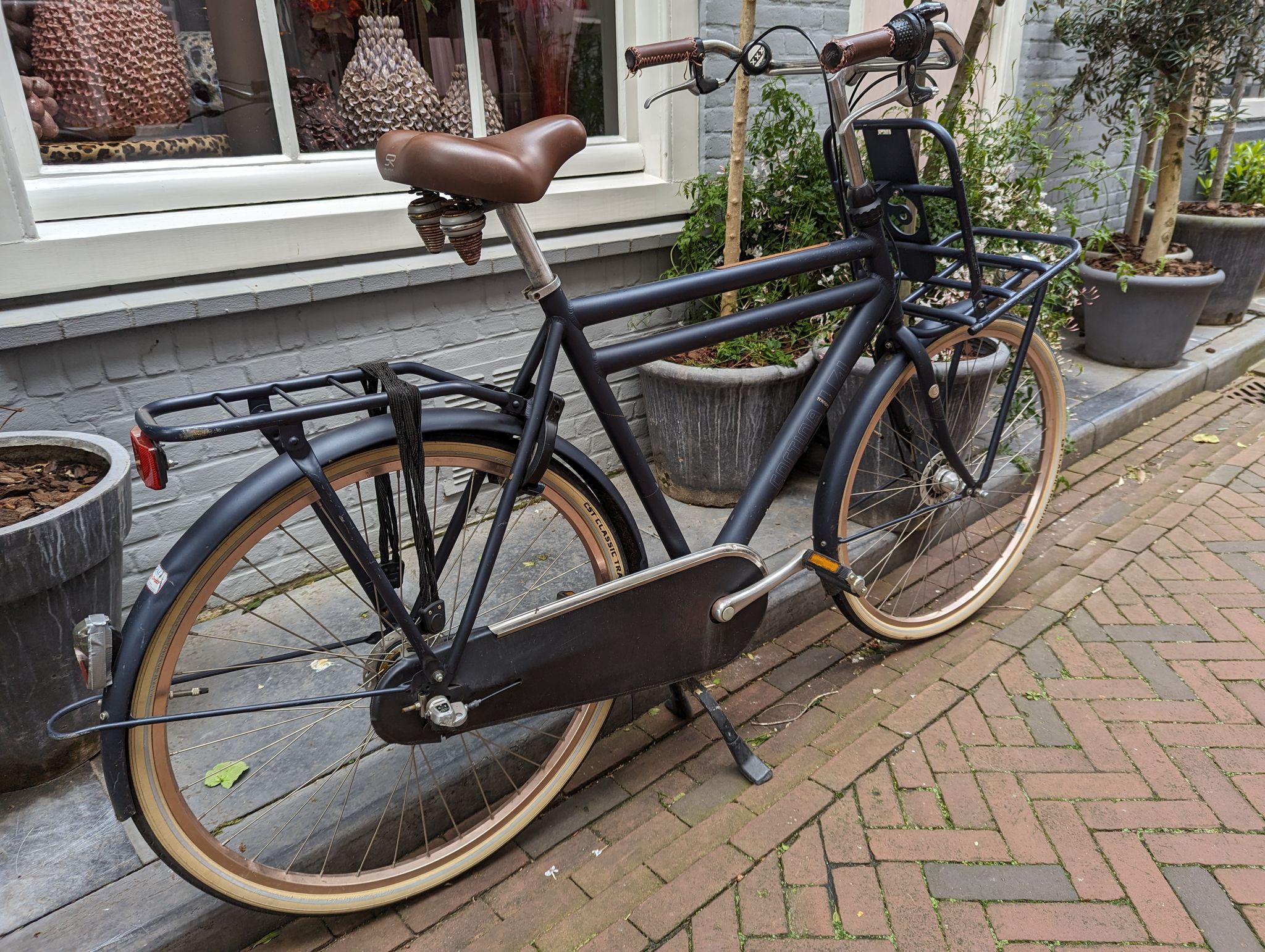  Netherlands, 21 Apr 2024  This bike parked in Middelburg is typical of Dutch bikes, it features style, durability, comfort, and will be around when we're all long gone.
